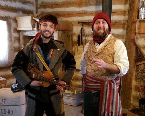 Picture of two men in Voyageur attire