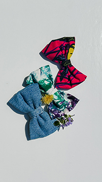 three bowties made of different materials